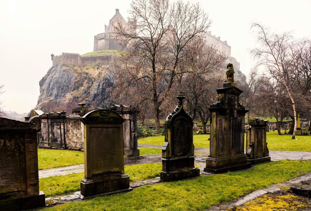 Edinburgh graveyard with Edinburgh castle in the background